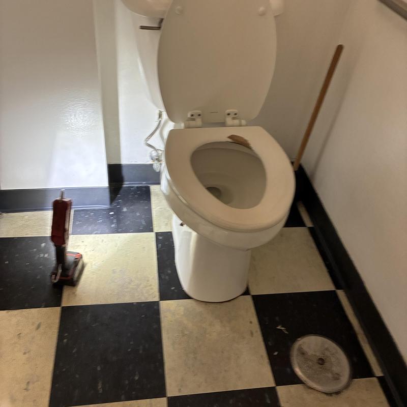 Technician inspecting cleanout and plumbing pipes in San Francisco
