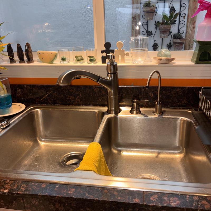 Technician inspecting cleanout and plumbing pipes in San Francisco