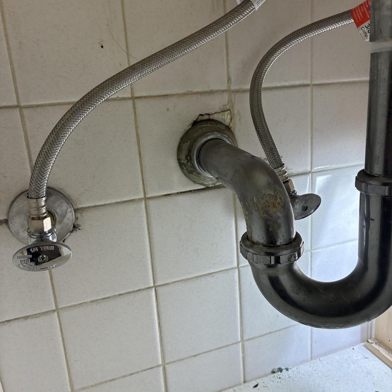 Technician inspecting cleanout and plumbing pipes in San Francisco