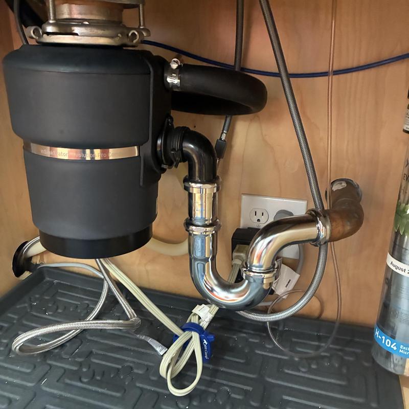 Technician inspecting cleanout and plumbing pipes in San Francisco