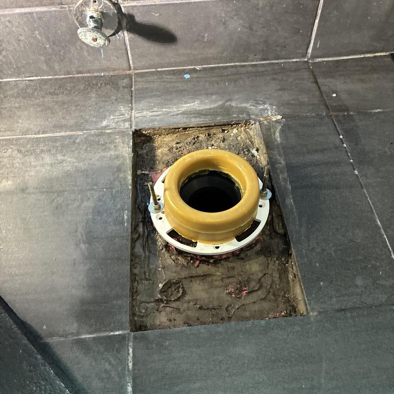 Technician inspecting cleanout and plumbing pipes in San Francisco