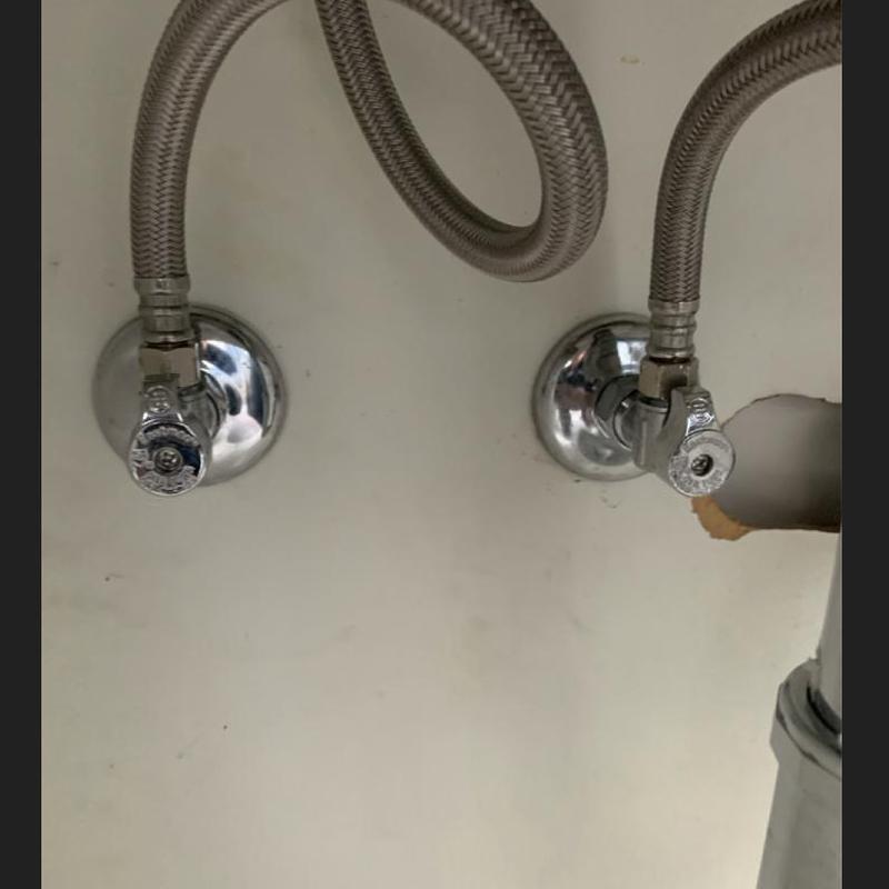 Technician inspecting cleanout and plumbing pipes in San Francisco