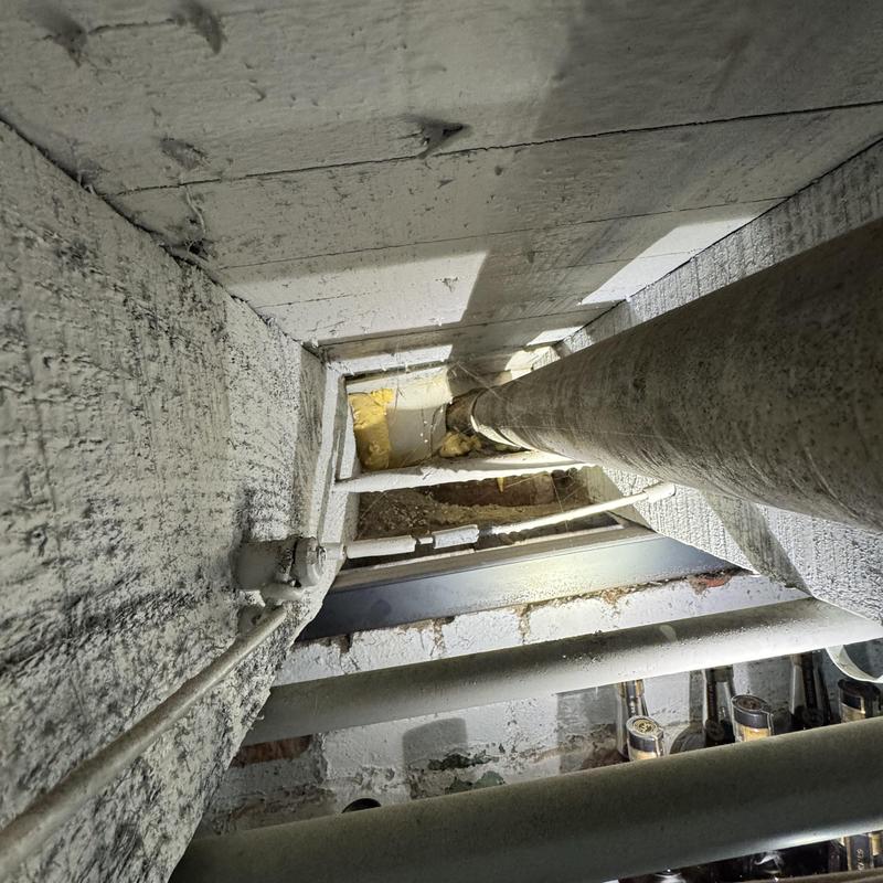 Technician inspecting cleanout and plumbing pipes in San Francisco