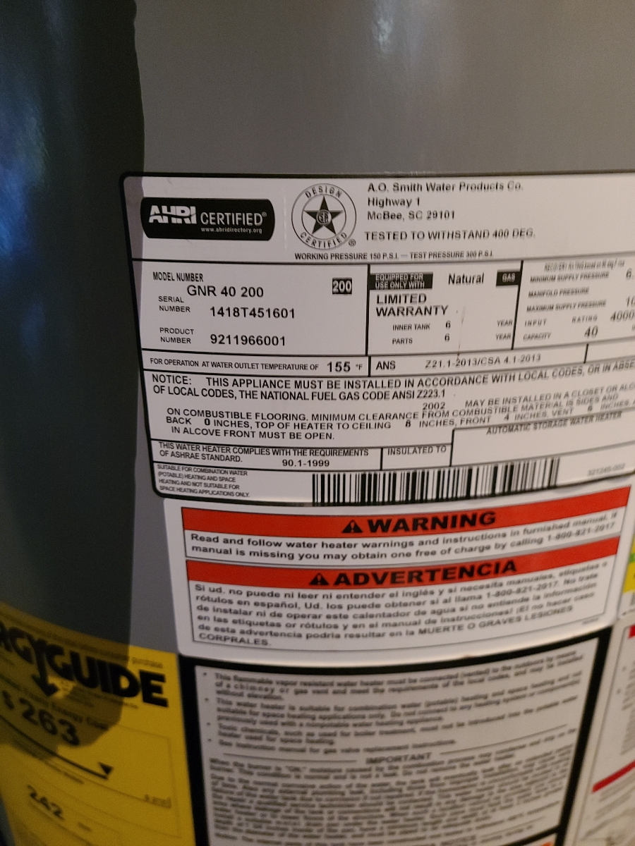 Detailed view of 40-Gallon Gas Water Heater Installation setup by Heise's Plumbing