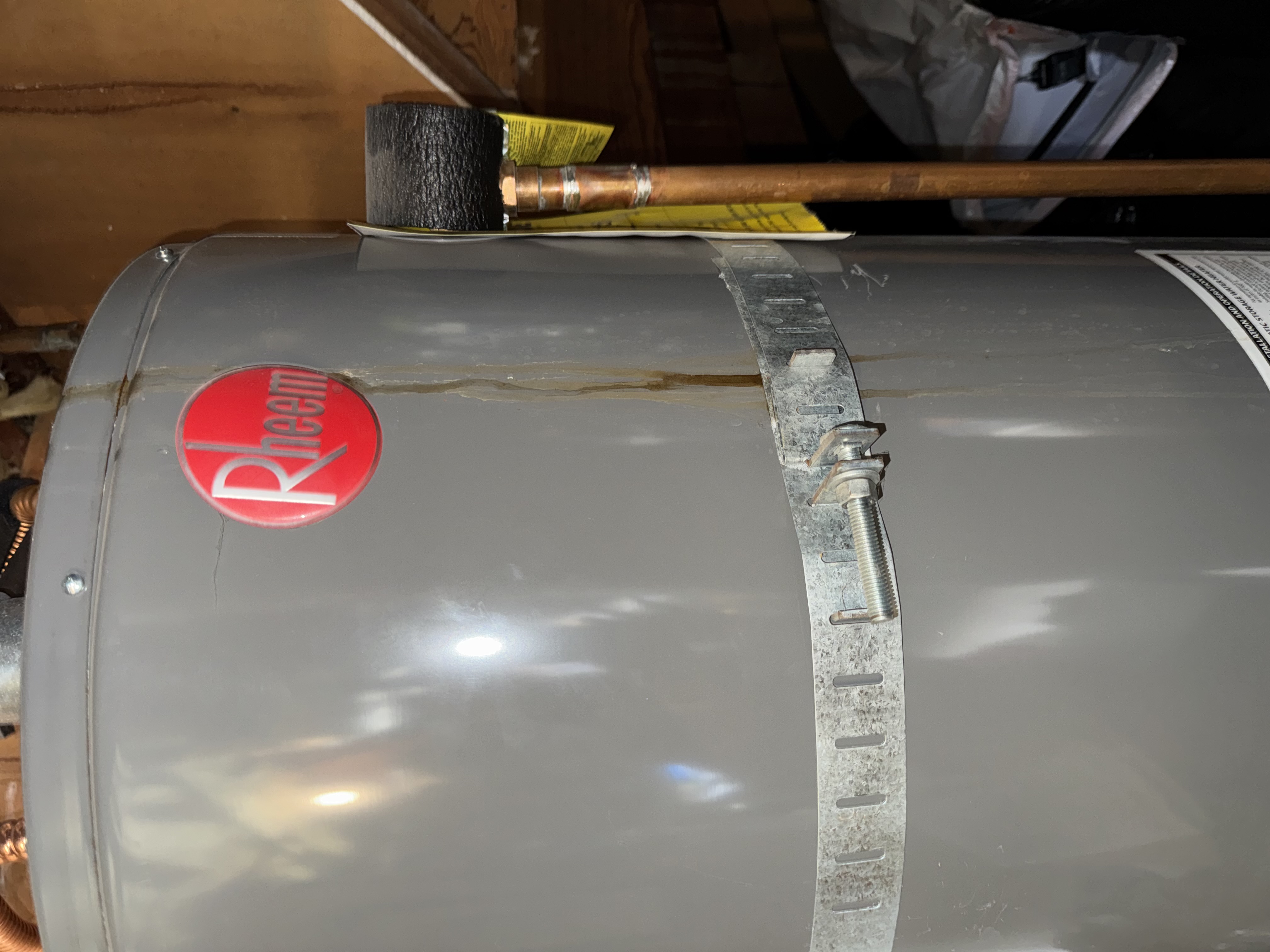 Professional water heater installation with new plumbing connections