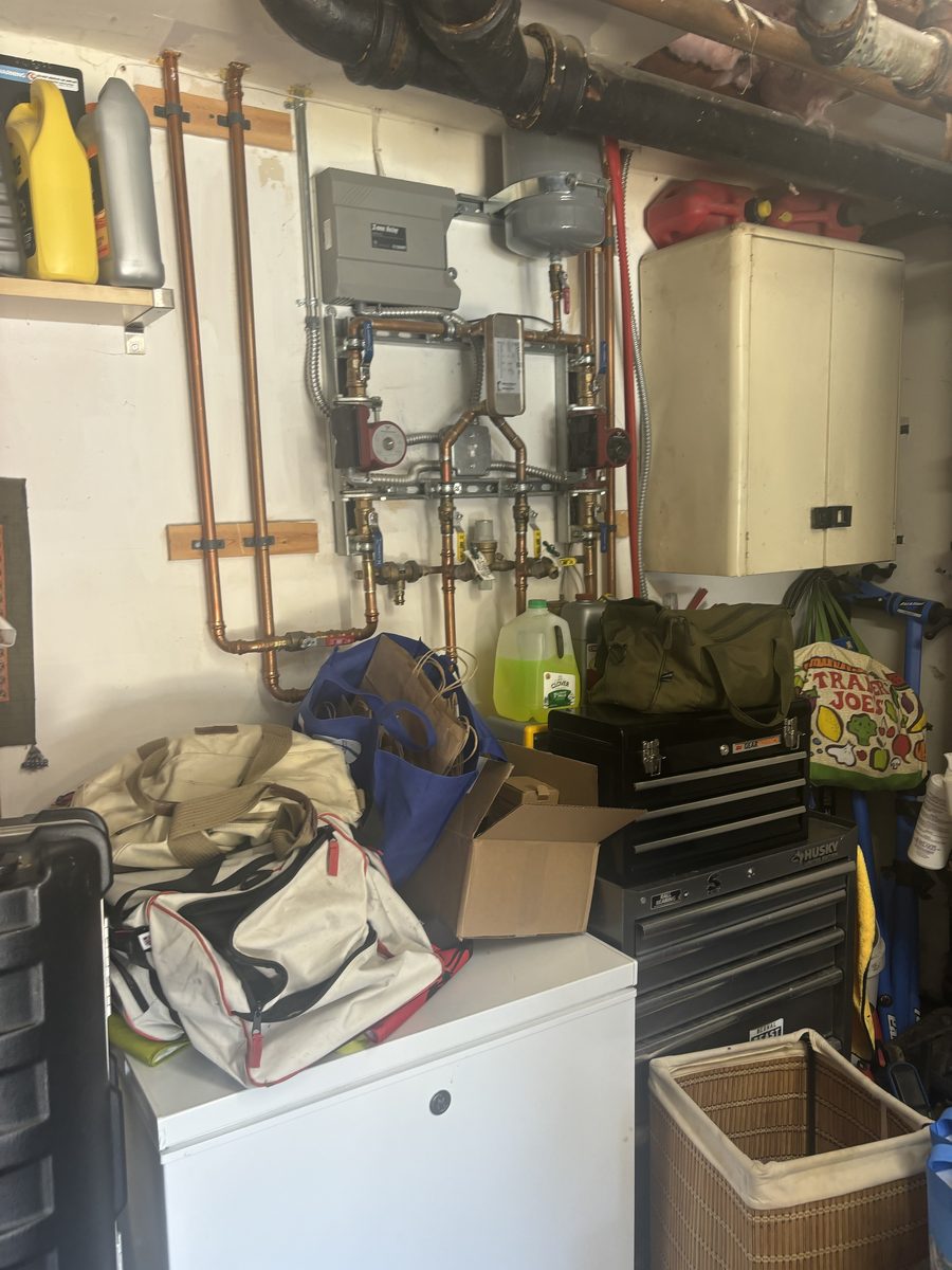 Detailed view of 50-Gallon Gas Water Heater Installation setup by Heise's Plumbing