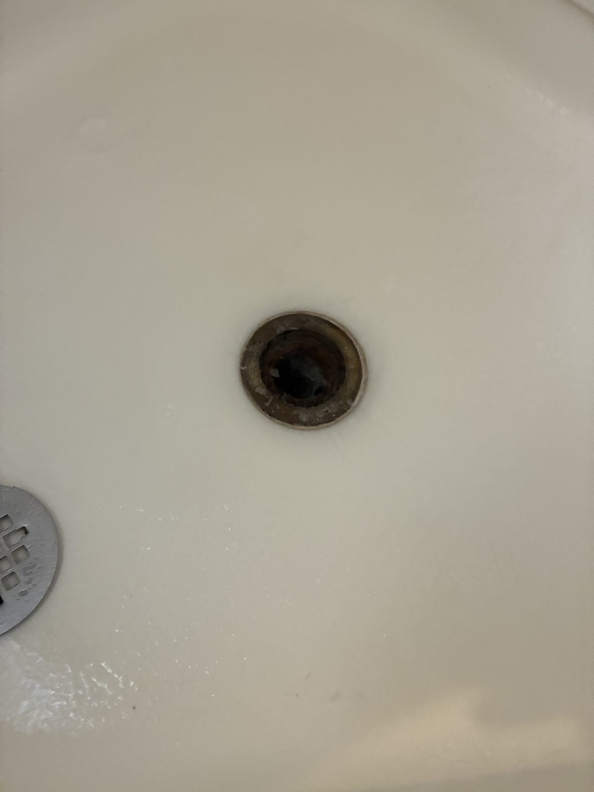 Technician inspecting cleanout and plumbing pipes in San Francisco