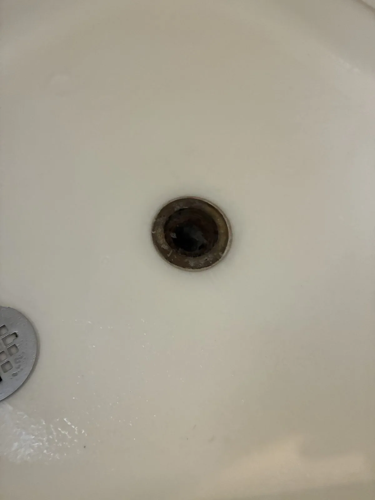 Technician inspecting cleanout and plumbing pipes in San Francisco