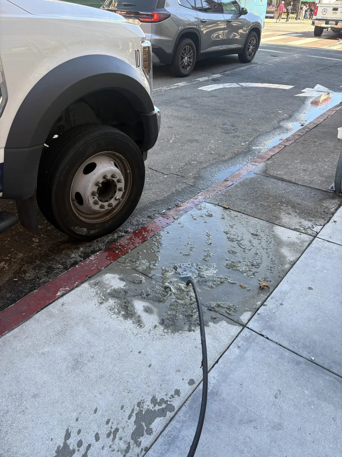 Technician inspecting cleanout and plumbing pipes in San Francisco