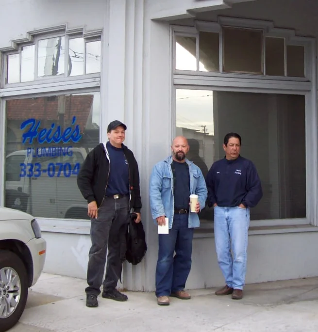 Dave Castillo and the Heise's Plumbing crew standing in front of their San Francisco storefront