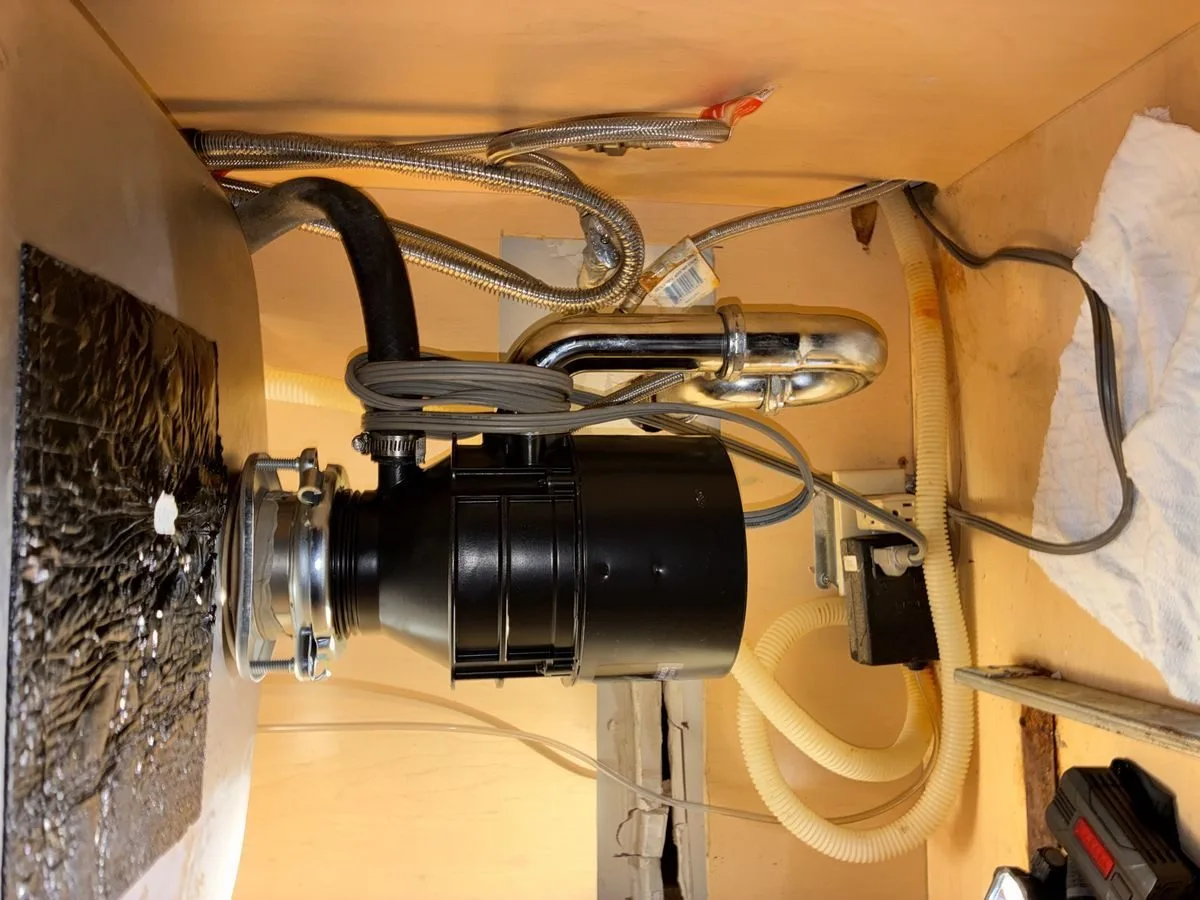 Detailed view of Garbage Disposal Installation and Leak Repair setup by Heise's Plumbing