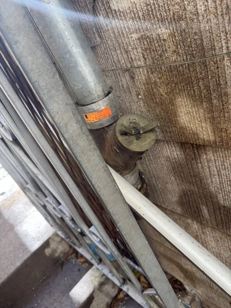 Technician inspecting cleanout and plumbing pipes in San Francisco