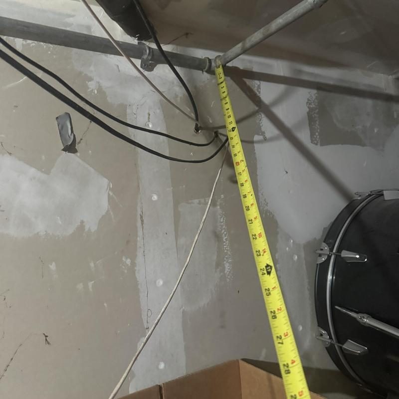 Technician inspecting cleanout and plumbing pipes in San Francisco