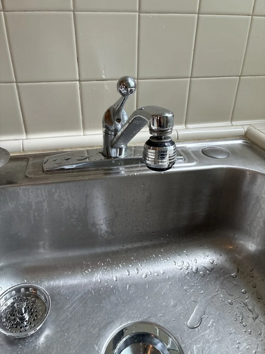 Kitchen sink P-trap during drain cleaning in Excelsior