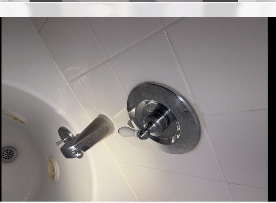 Technician inspecting cleanout and plumbing pipes in San Francisco