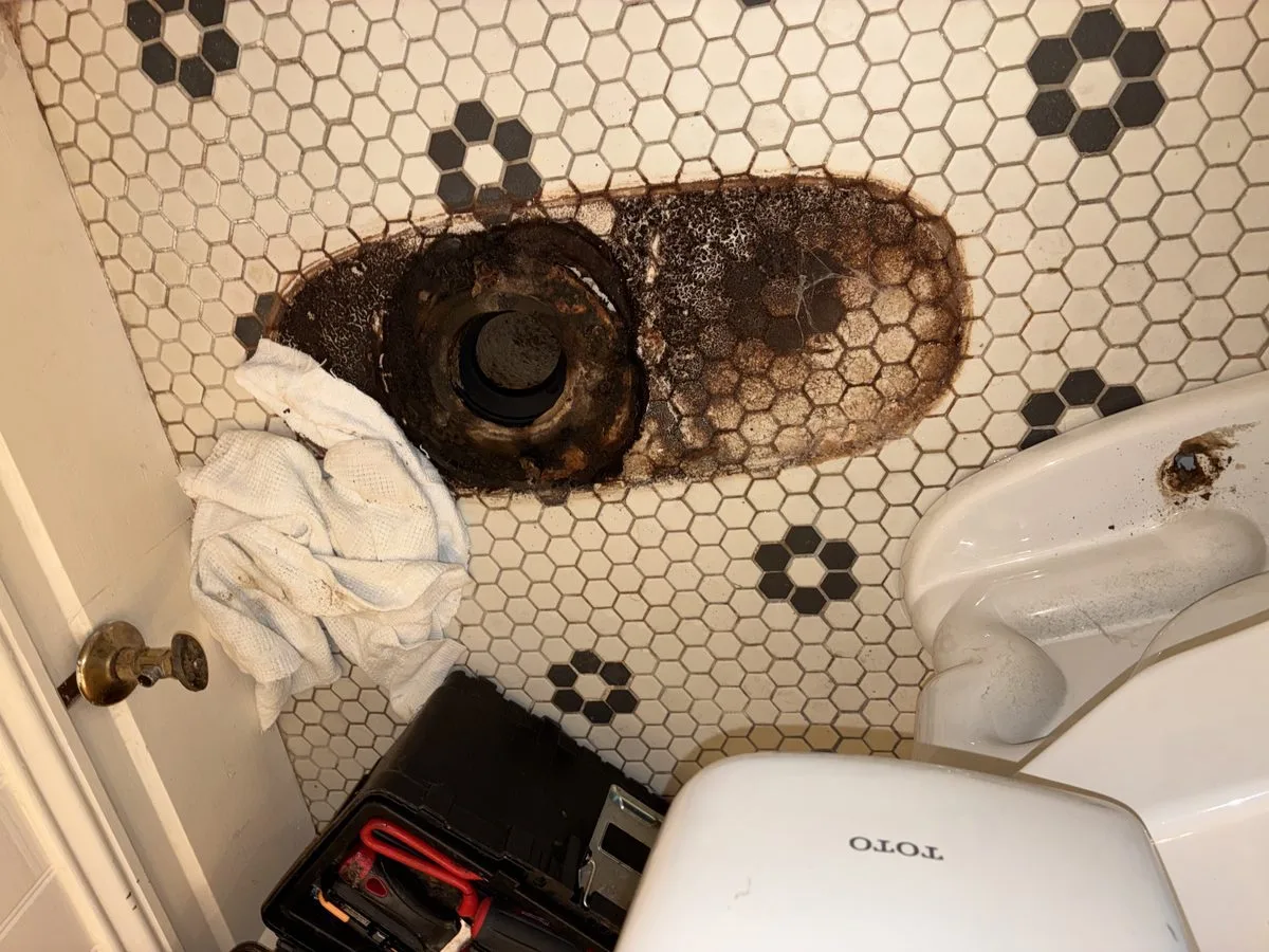 Technician inspecting cleanout and plumbing pipes in San Francisco
