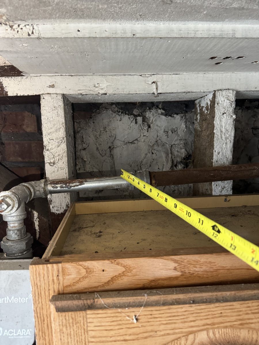 Technician inspecting cleanout and plumbing pipes in San Francisco