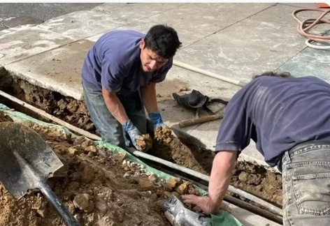 Heise's Plumbing workers excavating for water and sewer line repair in San Francisco