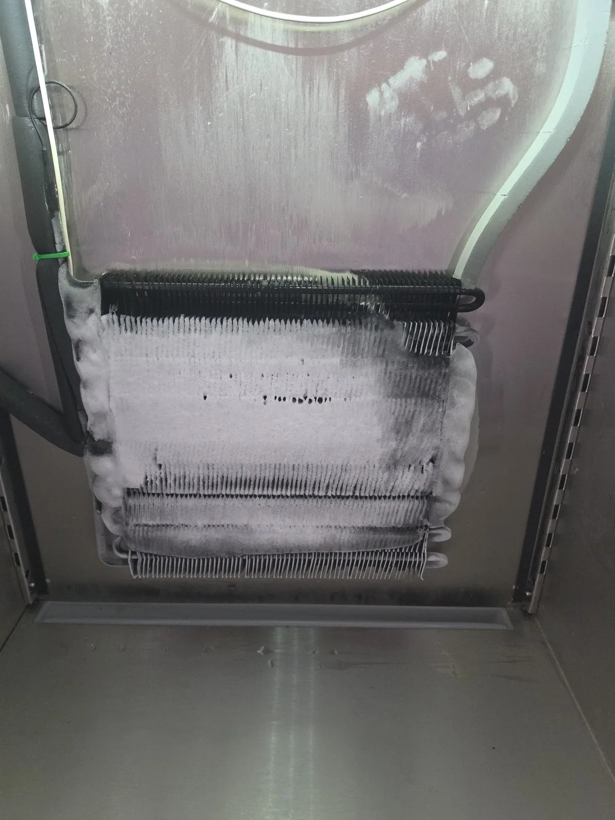 Detailed view of Sub-Zero Refrigerator Evaporator Defrosting setup by Heise's Plumbing