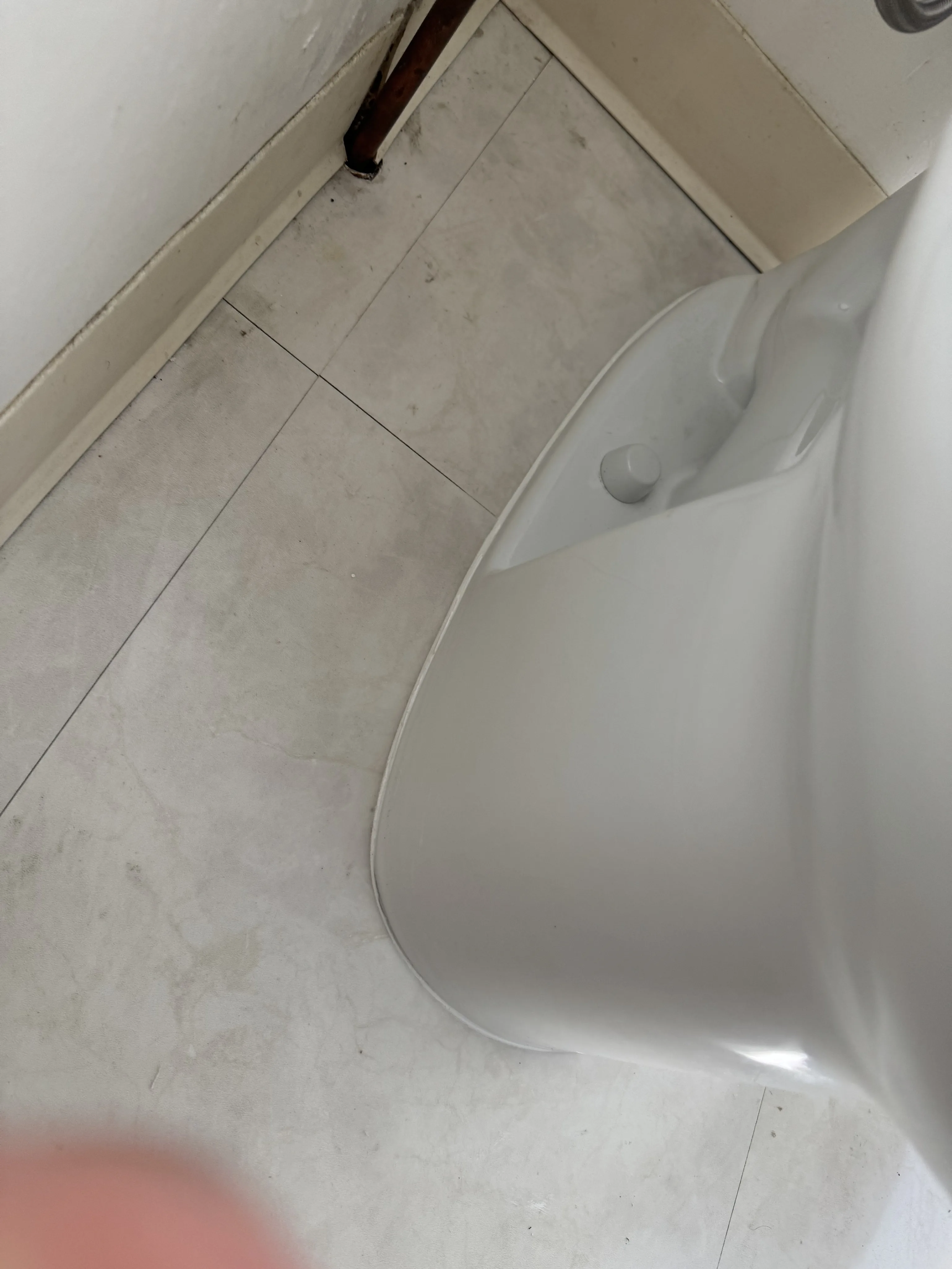 Technician inspecting cleanout and plumbing pipes in San Francisco