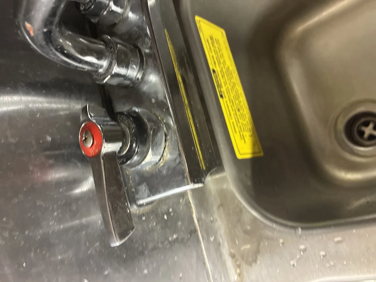 Technician inspecting cleanout and plumbing pipes in San Francisco