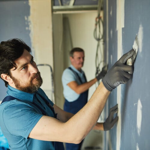 Contractors work on renovations.